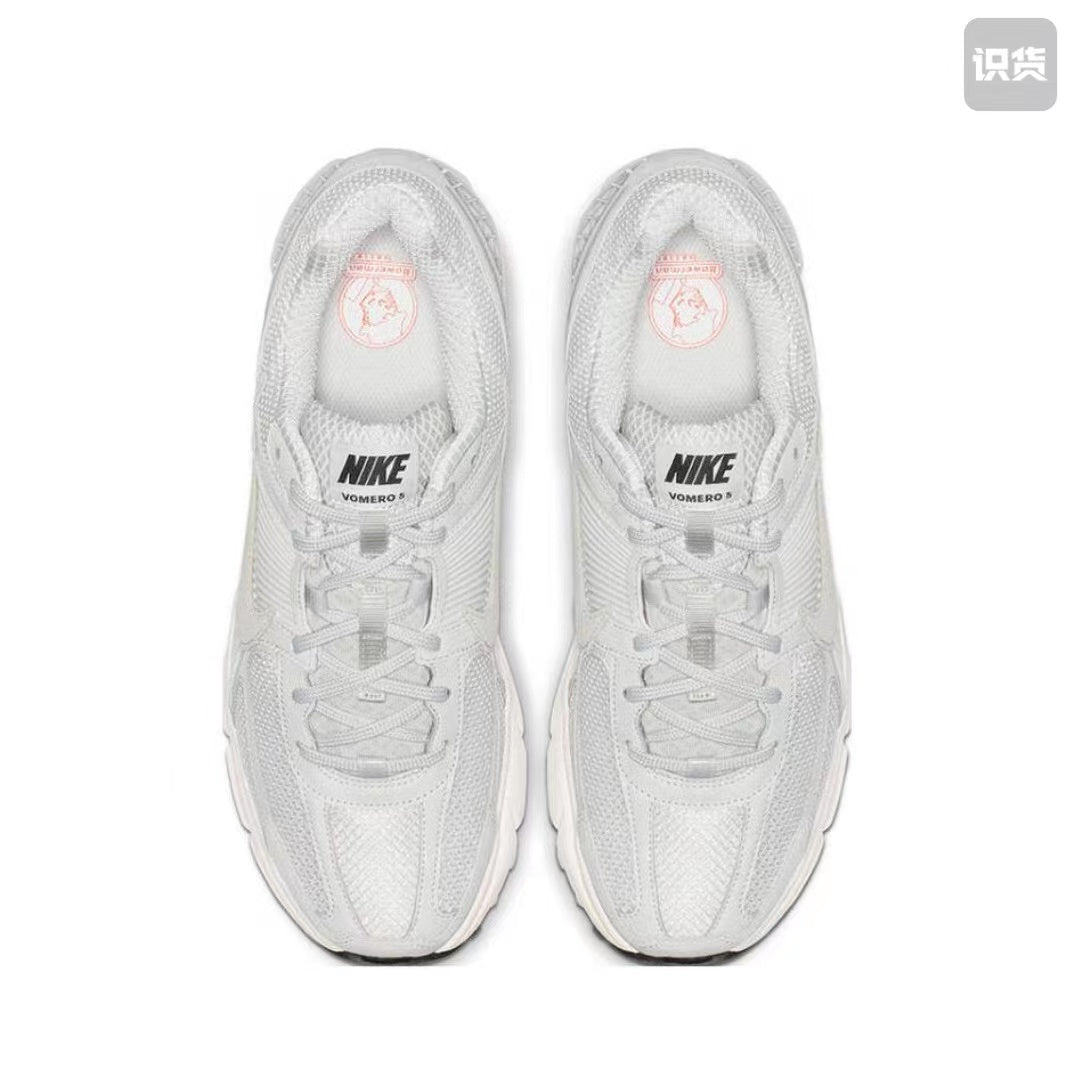 Nike Zoom Vomero 5 Sneakers in Grey and White - product image from the listing.