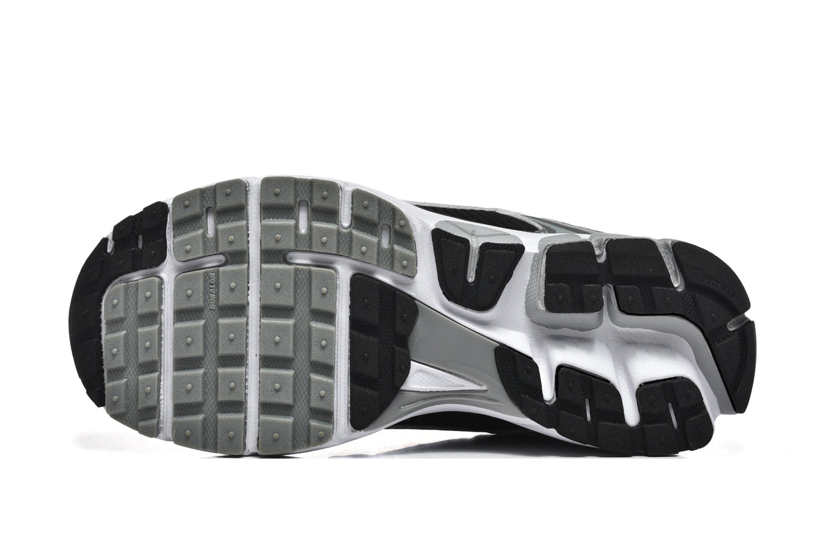 Nike Silver and Black Mesh Trainers - product image from the listing.