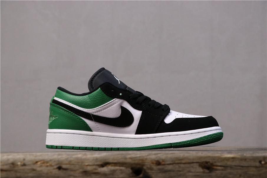 Jordan 1 Low Sneakers in Black Green 553558-113 - product image from the listing.