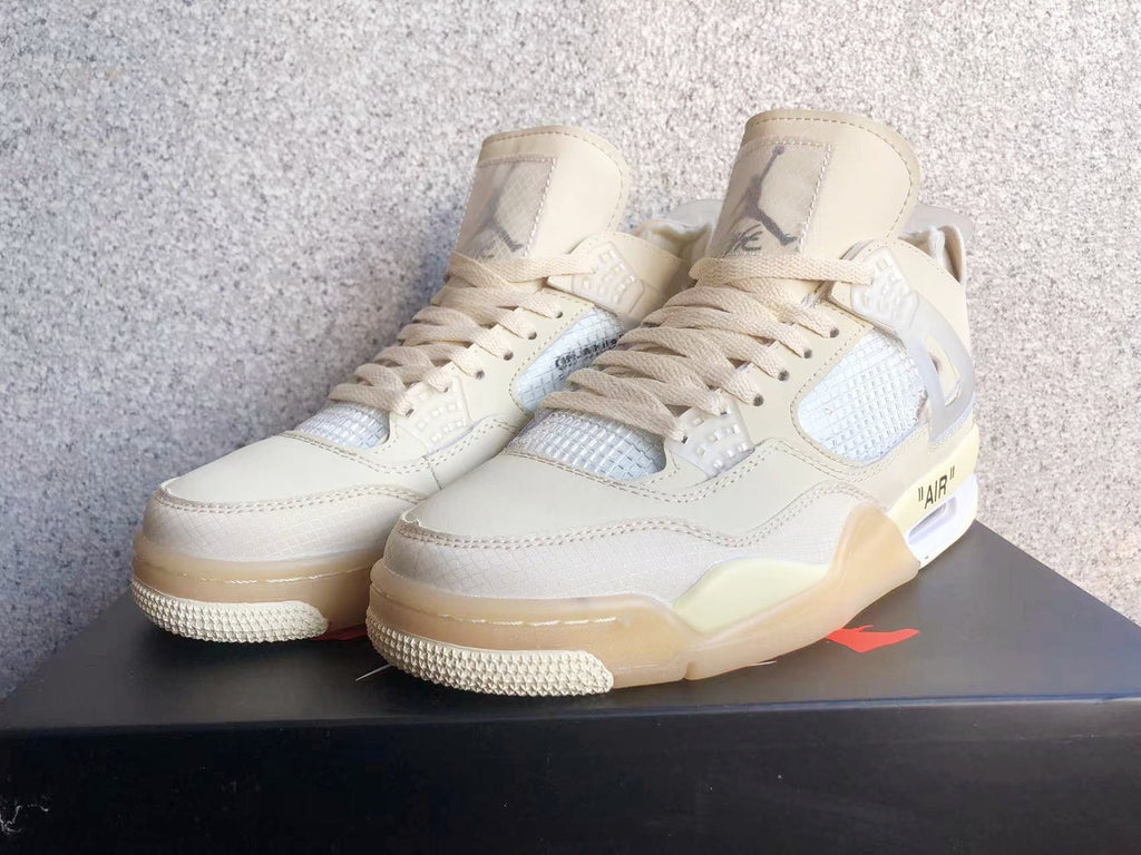 Jordan 4 Retro Sneakers in Off-White Sail - product image from the listing.