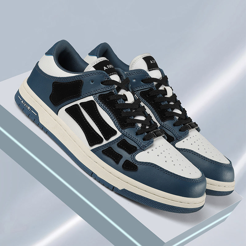 AMIRI Low-Top Sneakers in Navy, in White and Black - product image from the listing.