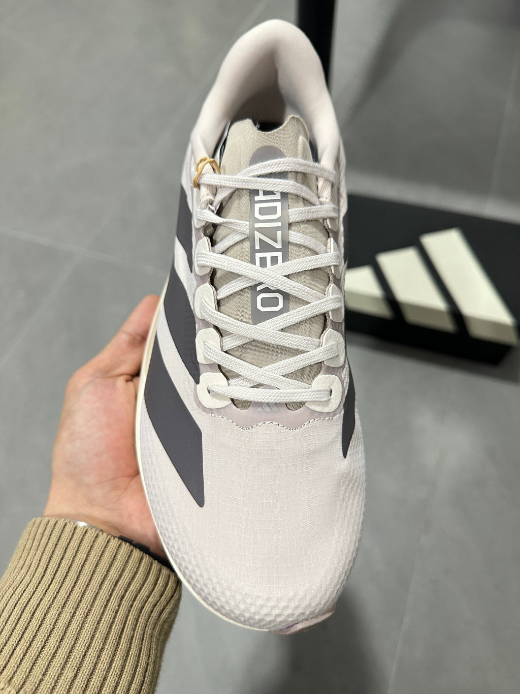 Adidas Lightstrike Pro Running Shoes in White and Gray KJ2001 - product image from the listing.