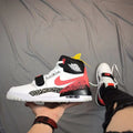 Jordan Legacy 312 Basketball Shoes in White Black Red - product image from the listing.