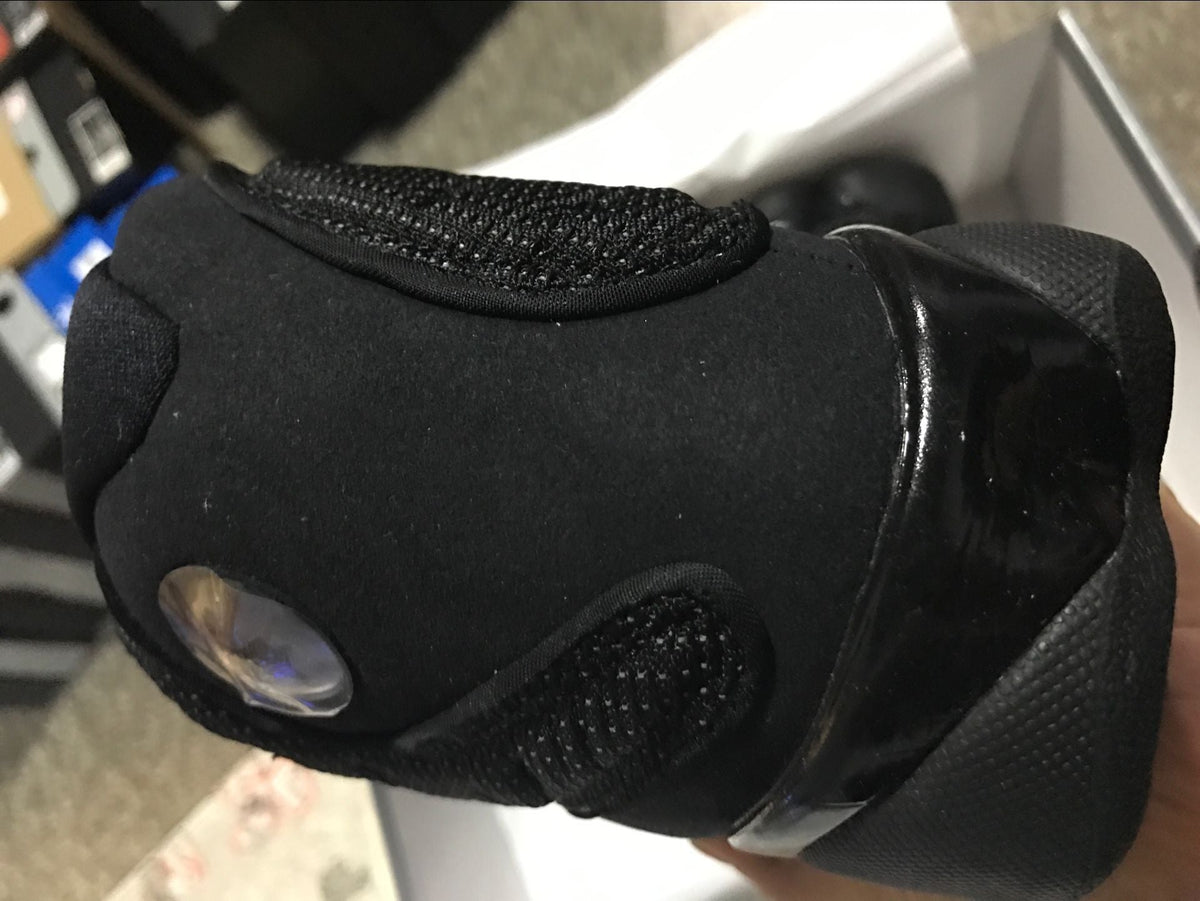 Air Jordan 13 Retro Black Cat Basketball Sneakers in Black - product image from the listing.