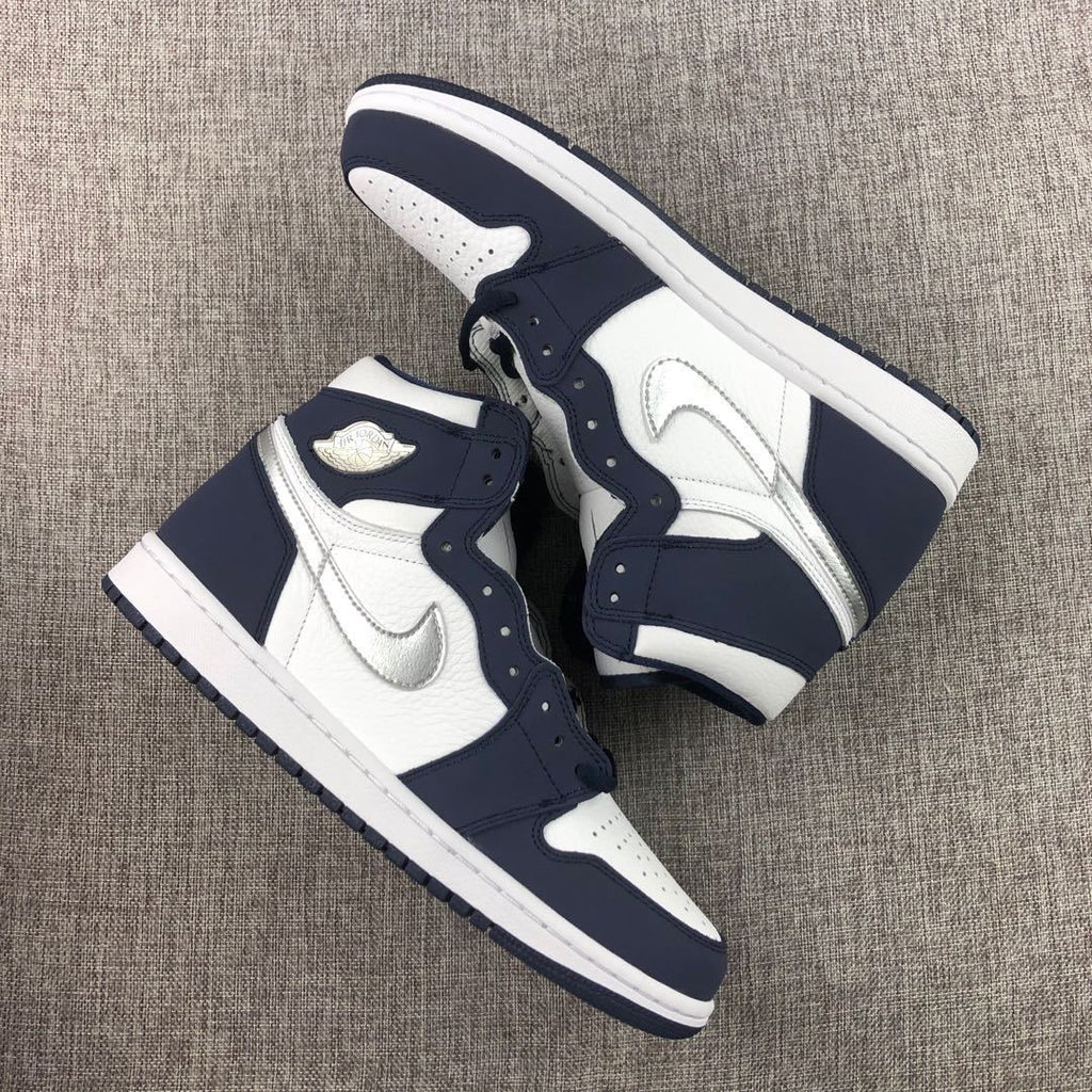 Air Jordan 1 Co.JP High Sneakers White Navy Silver DC1788-100 - product image from the listing.