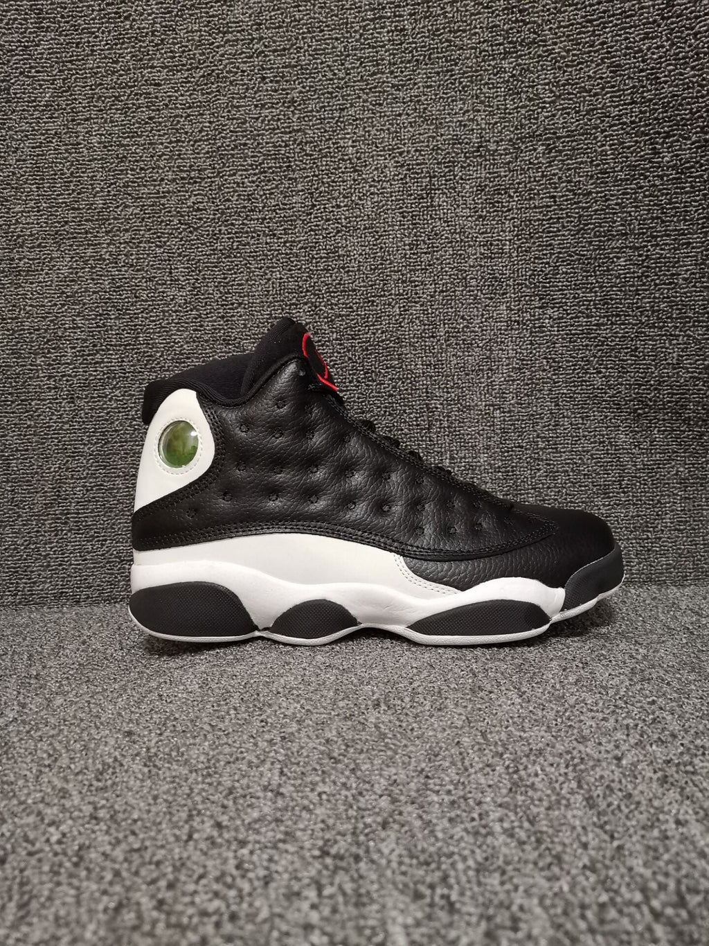 Air Jordan 13 Retro Black Red White Sneakers - product image from the listing.