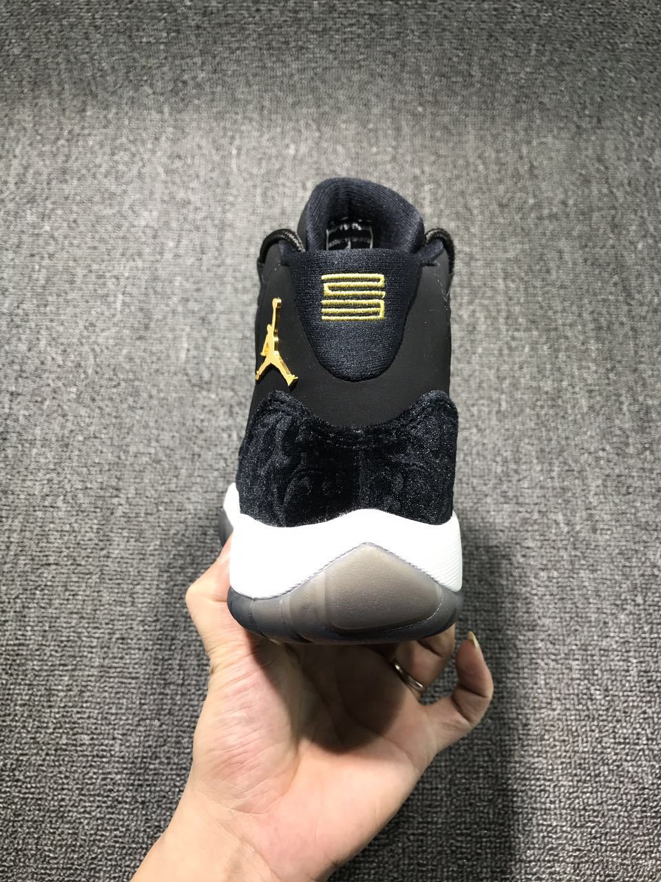 Jordan 11 Black Velvet High-Cut Sneakers - product image from the listing.