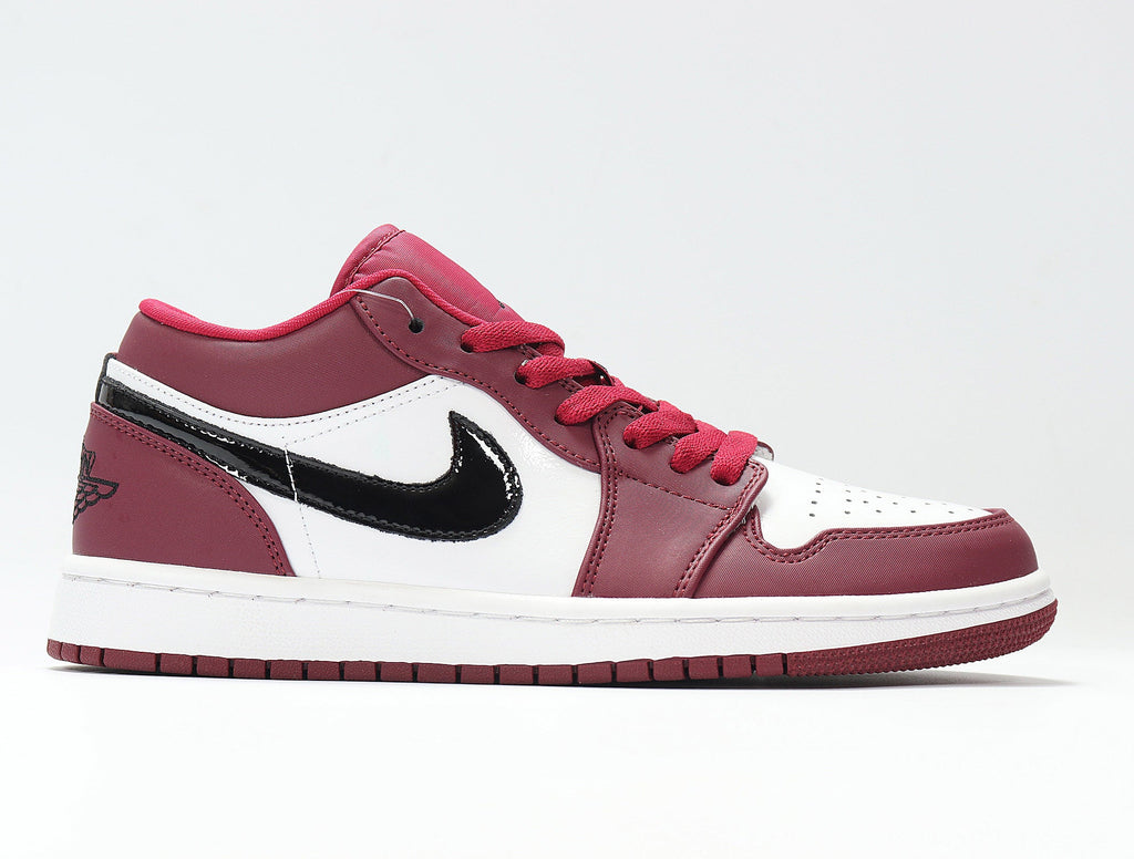 Air Jordan 1 Low Sneakers in Red and White 553558-604 - product image from the listing.