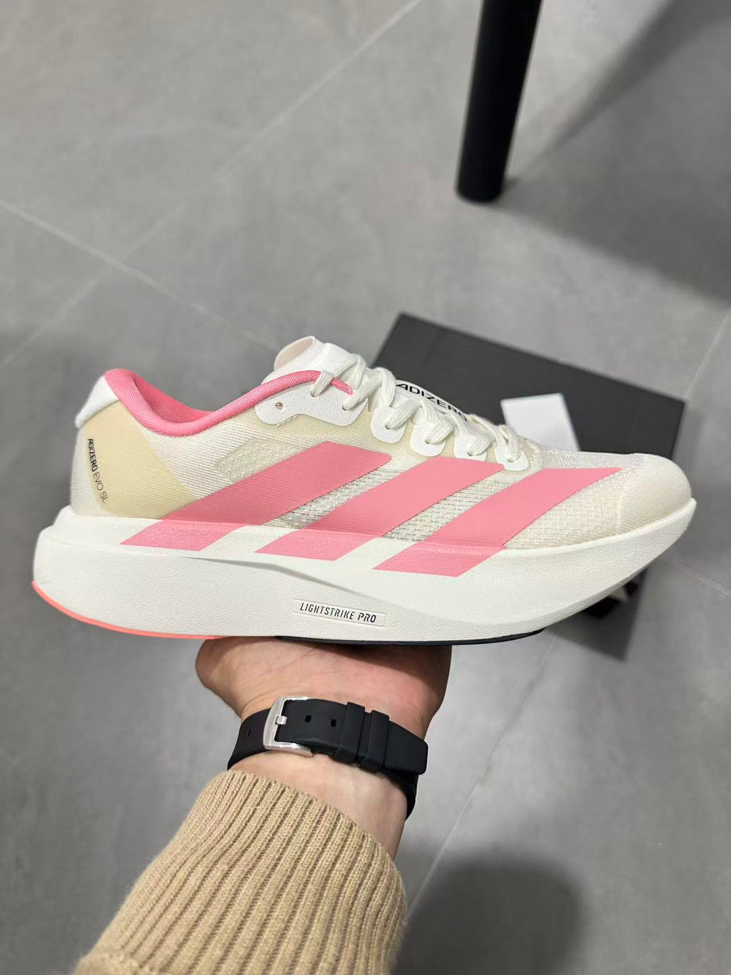 adidas Adizero Lightstrike Pro Running Shoes in White Pink - product image from the listing.