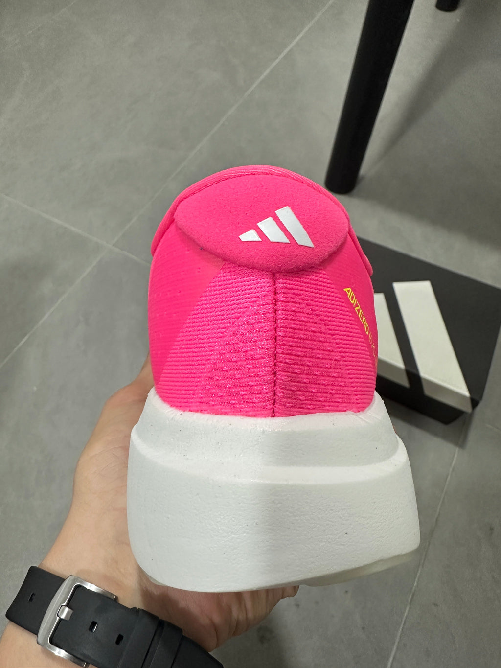 Adidas Adizero Lightstrike Pro Running Shoes in Pink - product image from the listing.