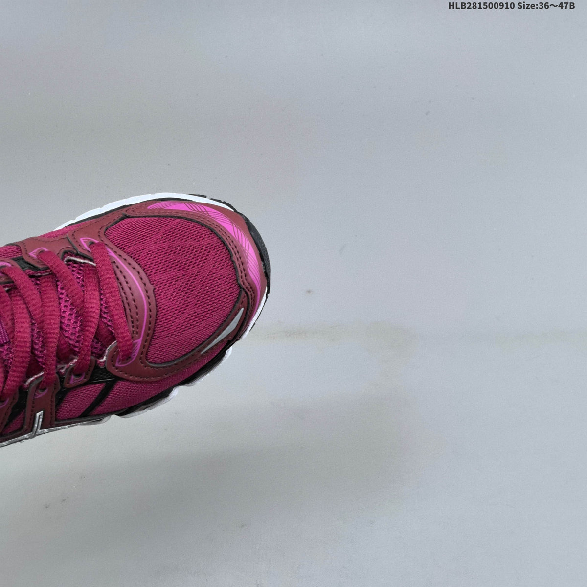 ASICS Gel-Nimbus 16 Running Sneakers in Burgundy Pink - product image from the listing.