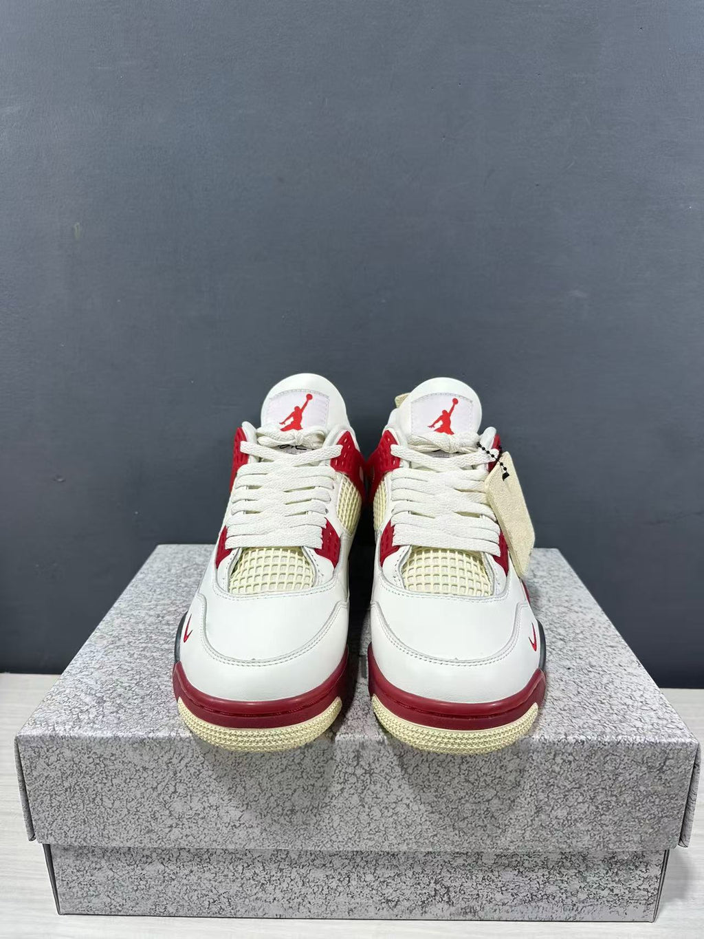 Air Jordan 4 Retro White Red Sneakers - product image from the listing.