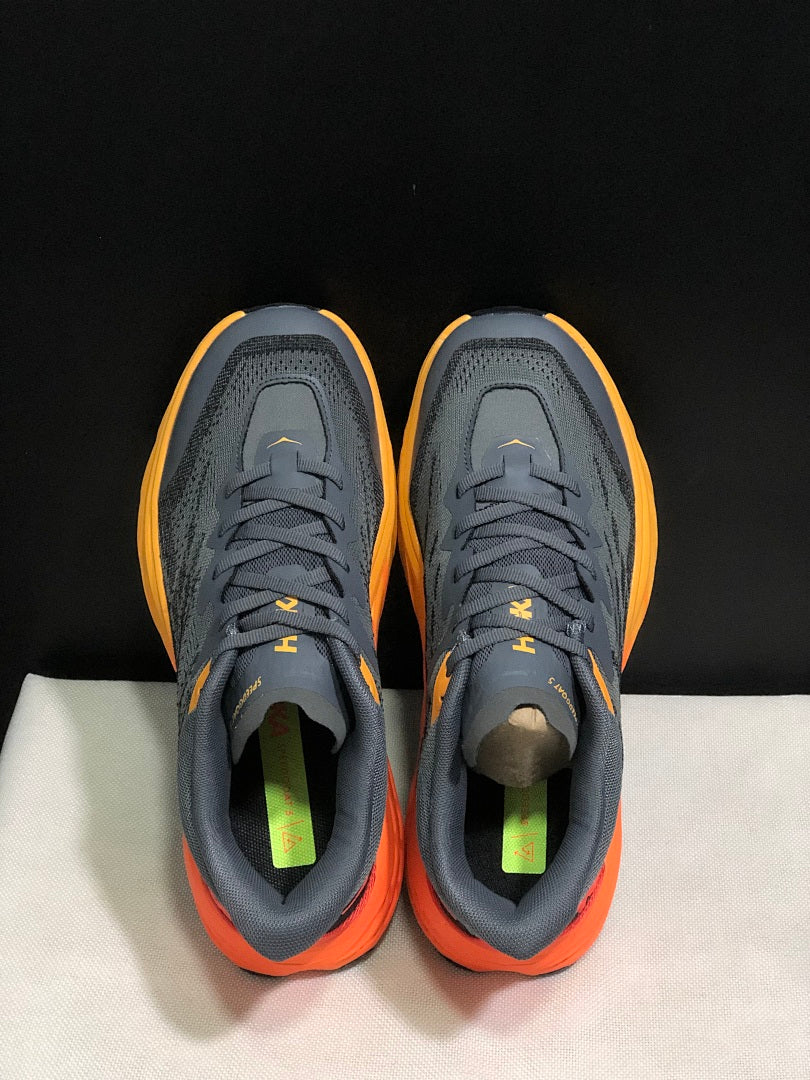 HOKA Speedgoat 5 Trail Running Shoes, in Gray and Orange - product image from the listing.