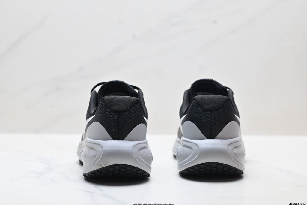 Nike Revolution 8 Running Shoes in Black - product image from the listing.