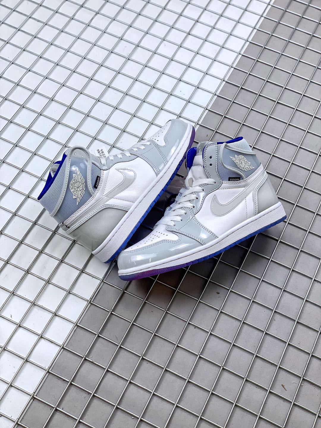 Air Jordan 1 High Zoom R2T Sneakers White Grey Blue - product image from the listing.