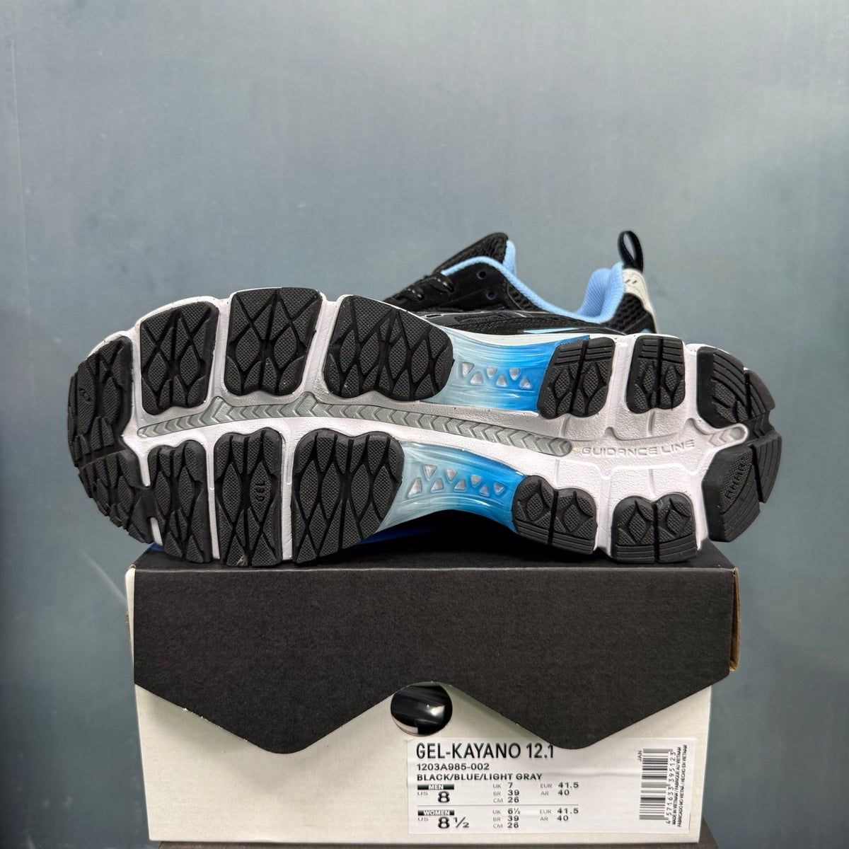 ASICS GEL-KAYANO 12.1 Running Sneakers in Black Blue - product image from the listing.