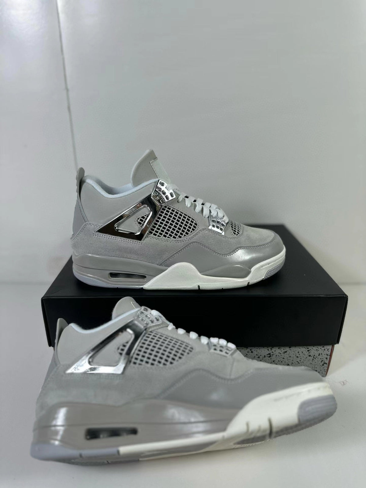 Air Jordan 4 Light Iron Ore Frozen Moments Sneakers - product image from the listing.