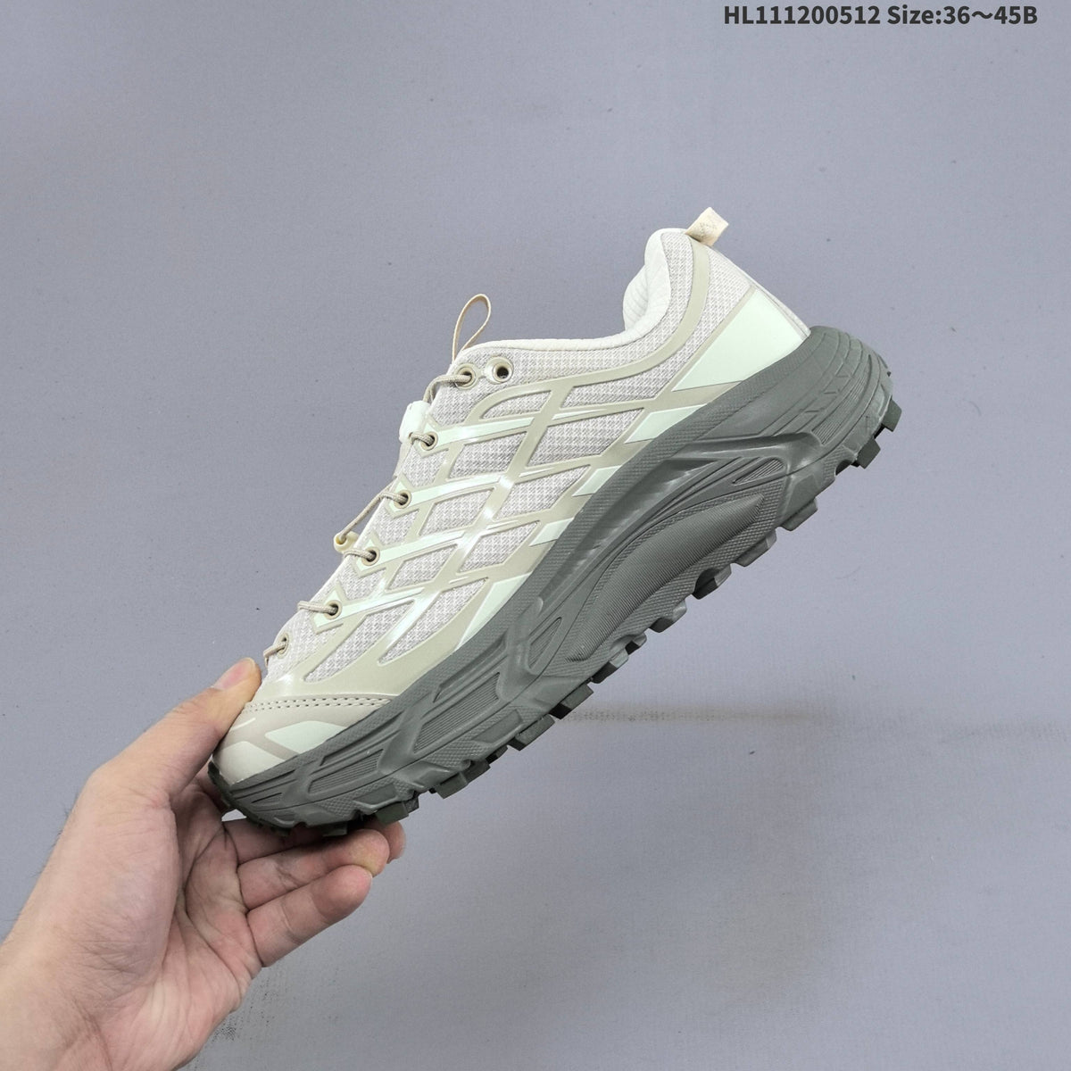HOKA Mafate Three 2 Trail Running Shoes in Cream and Gray - product image from the listing.