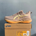 ASICS NOVABLAST 5 LE Running Shoes in Brown - product image from the listing.