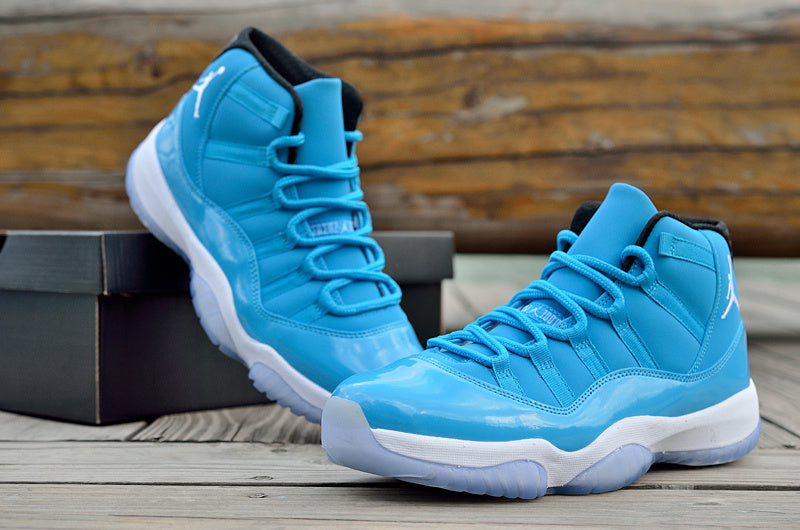 Blue and White Air Jordan 11 High Sneakers - product image from the listing.