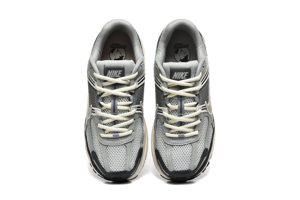 Grey and White Nike Zoom Vomero 5 Sneakers - product image from the listing.