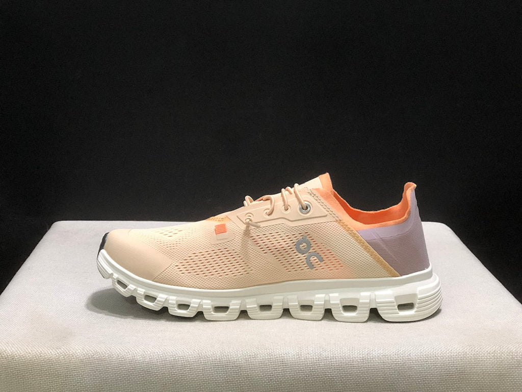 On Cloud 6 Coast Sneakers, in Cream and Orange - product image from the listing.