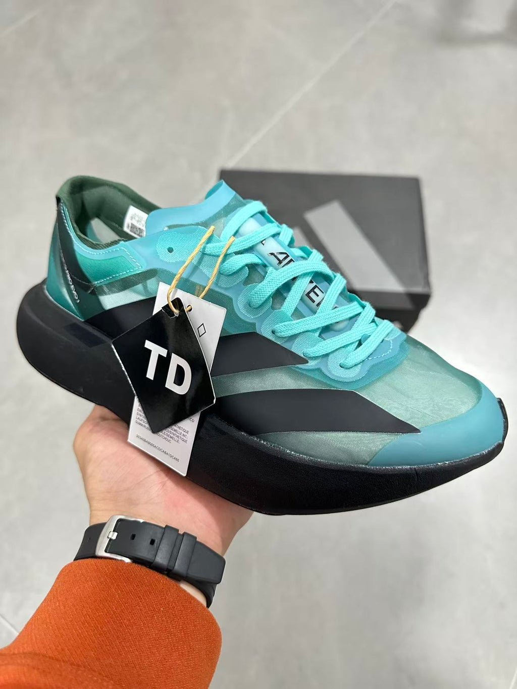 Nike Air Max Scorpion Flyknit Sneakers, in Turquoise and Black IH5588 - product image from the listing.
