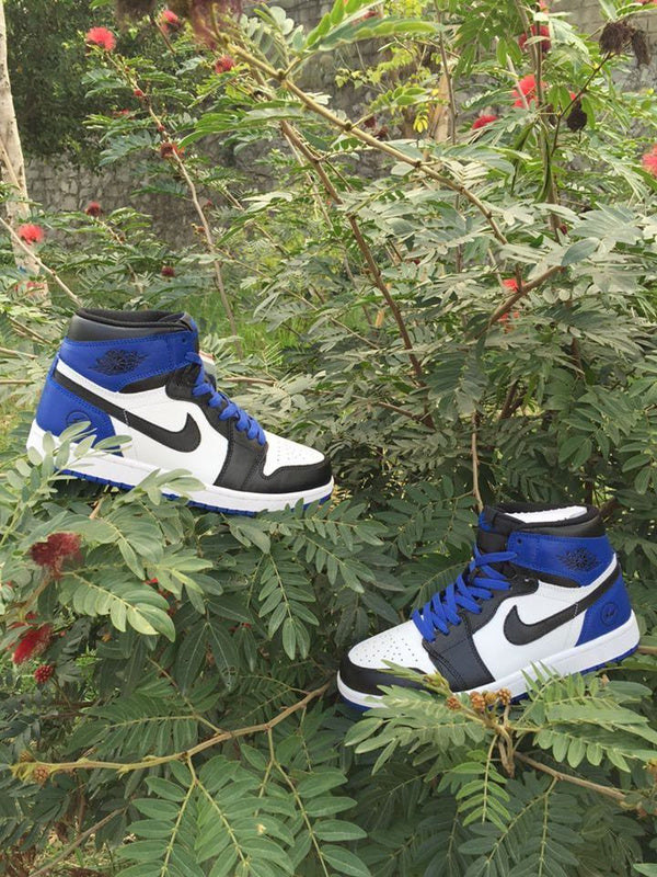 Jordan 1 High Sneakers in Black, in White and Royal Blue - product image from the listing.