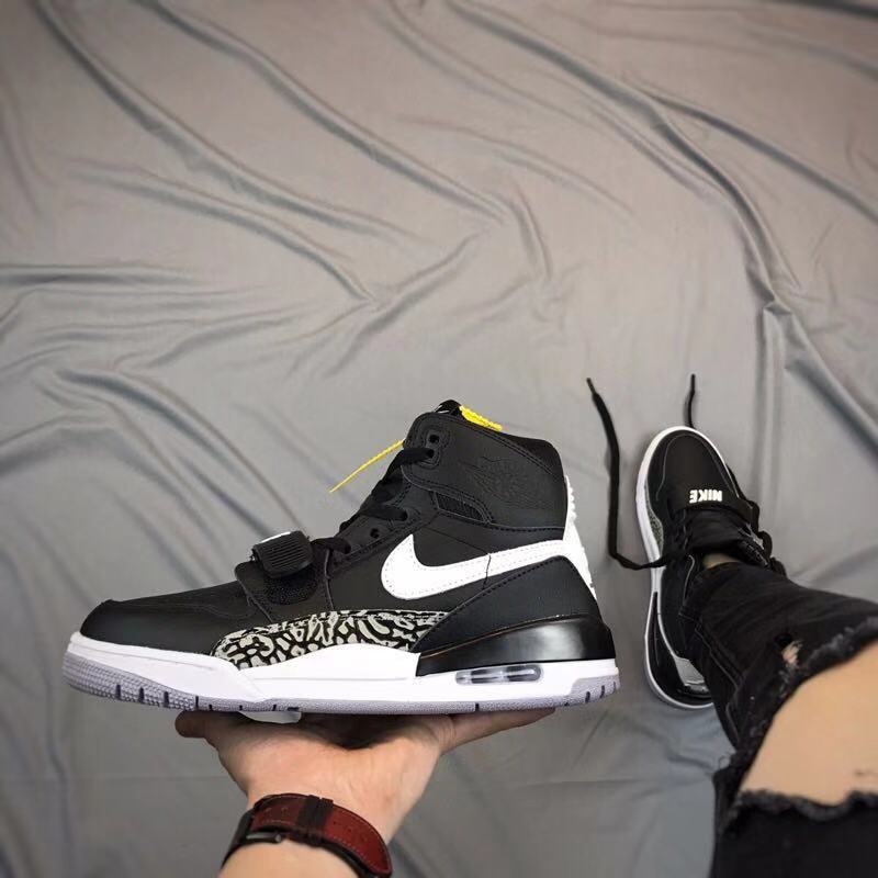 Air Jordan Legacy 312 High-Top Sneakers in Black and White - product image from the listing.