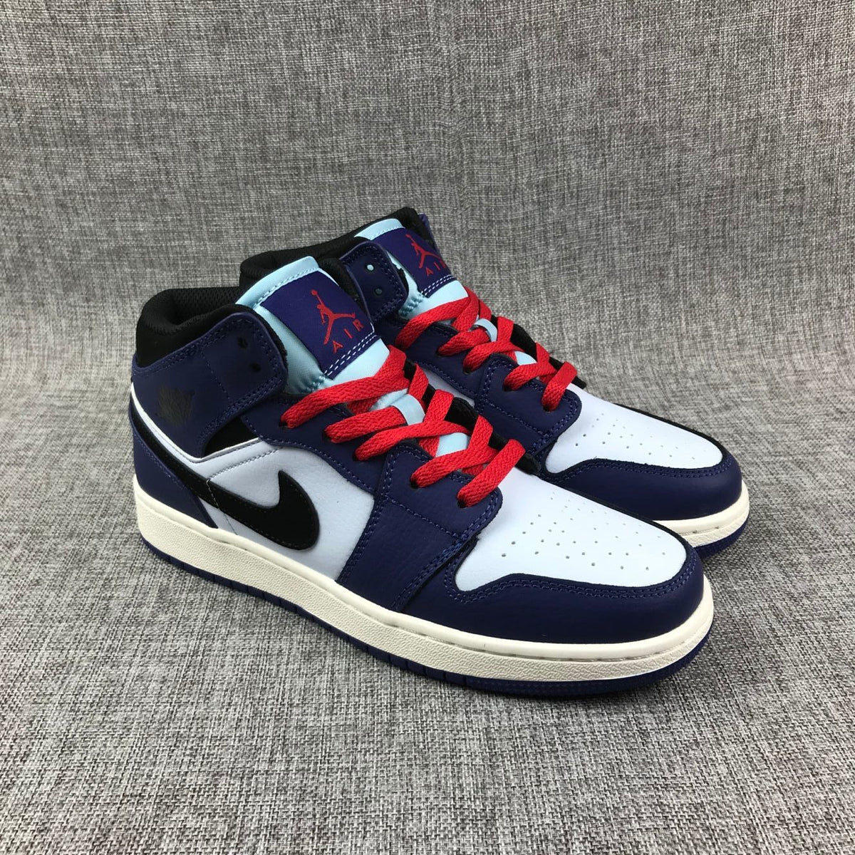 Air Jordan 1 Mid White, Sneakers in Black and Purple - product image from the listing.