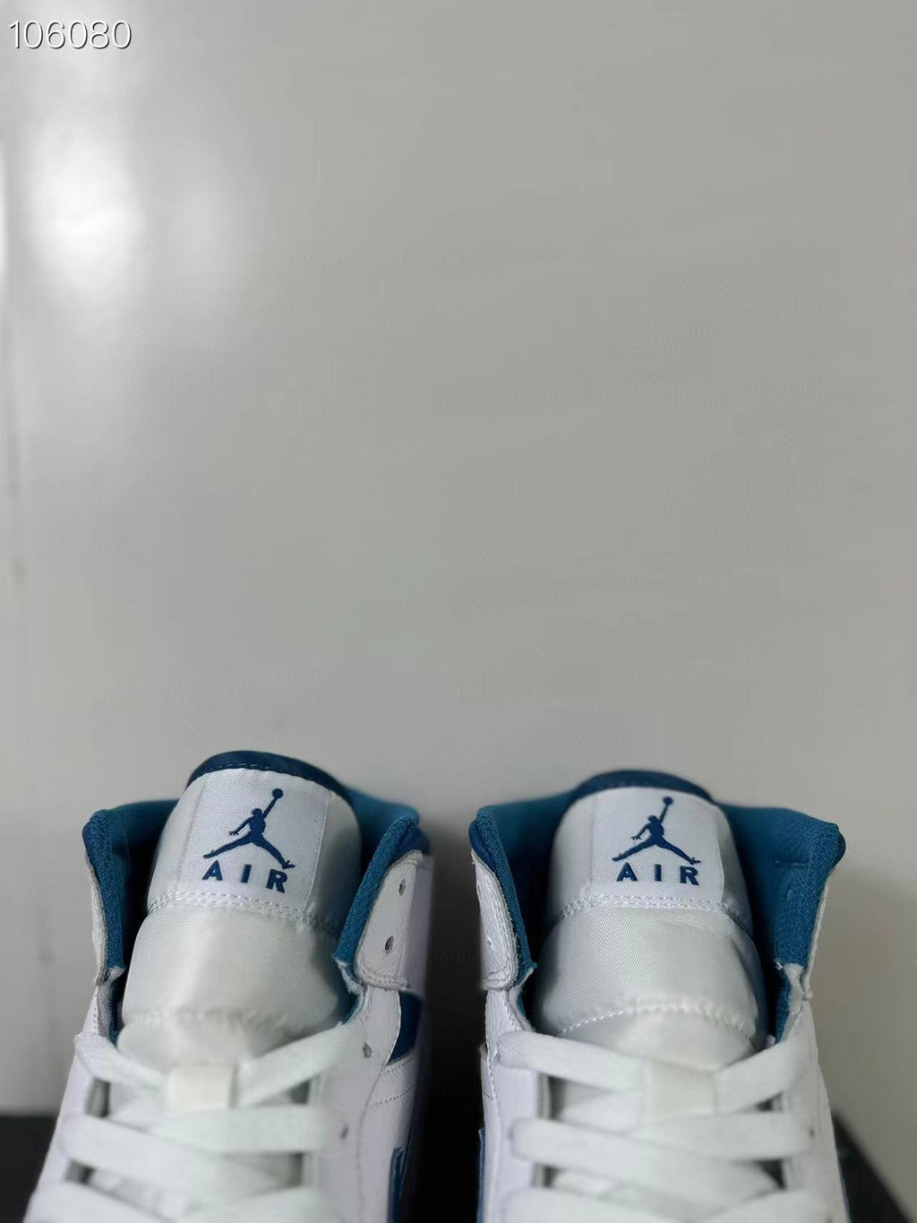 Air Jordan 1 Mid White Blue FN5215-141 Sneakers - product image from the listing.