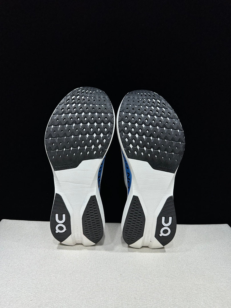 On Cloudboom Strike LS Running Shoes, in White and Blue - product image from the listing.