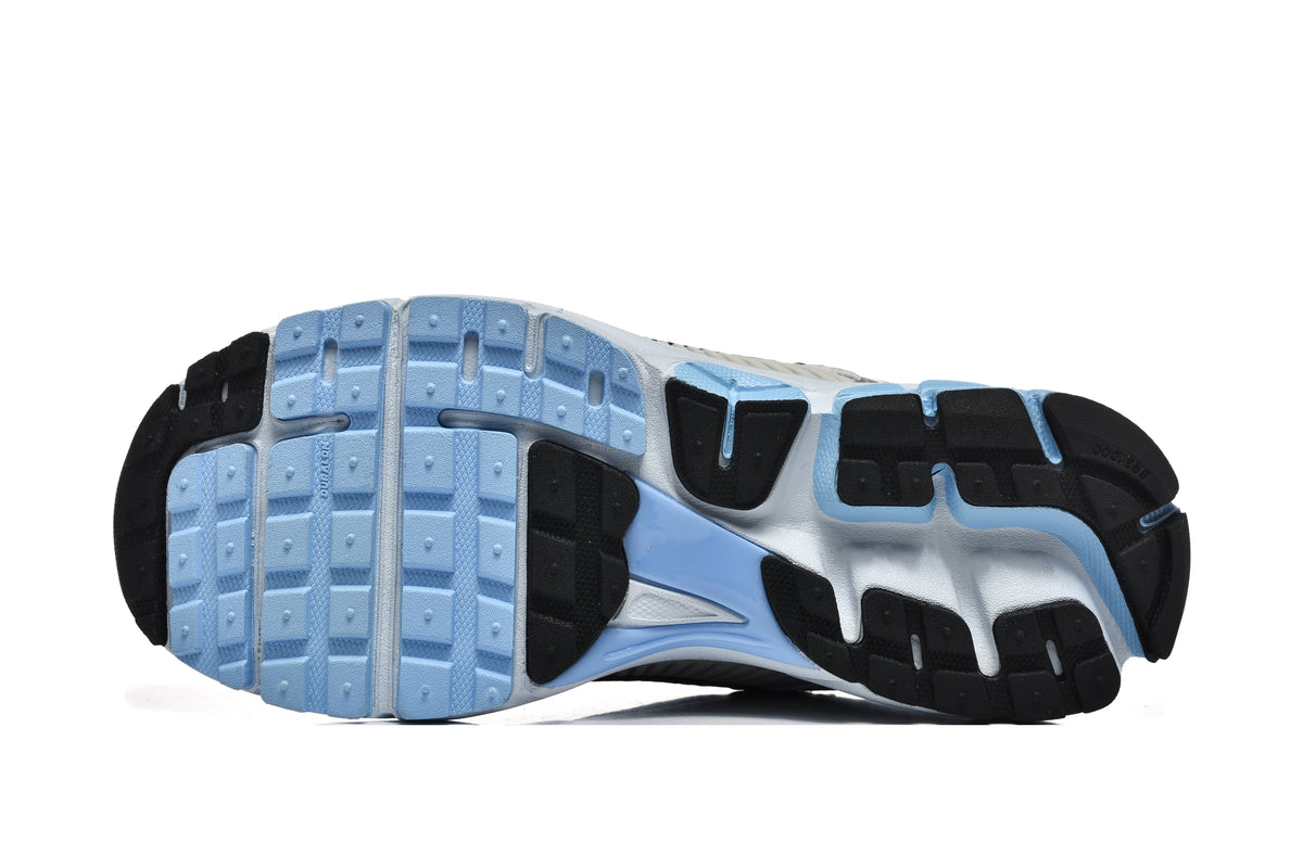Nike Vomero 5 Sneakers in Silver and Light Blue - product image from the listing.