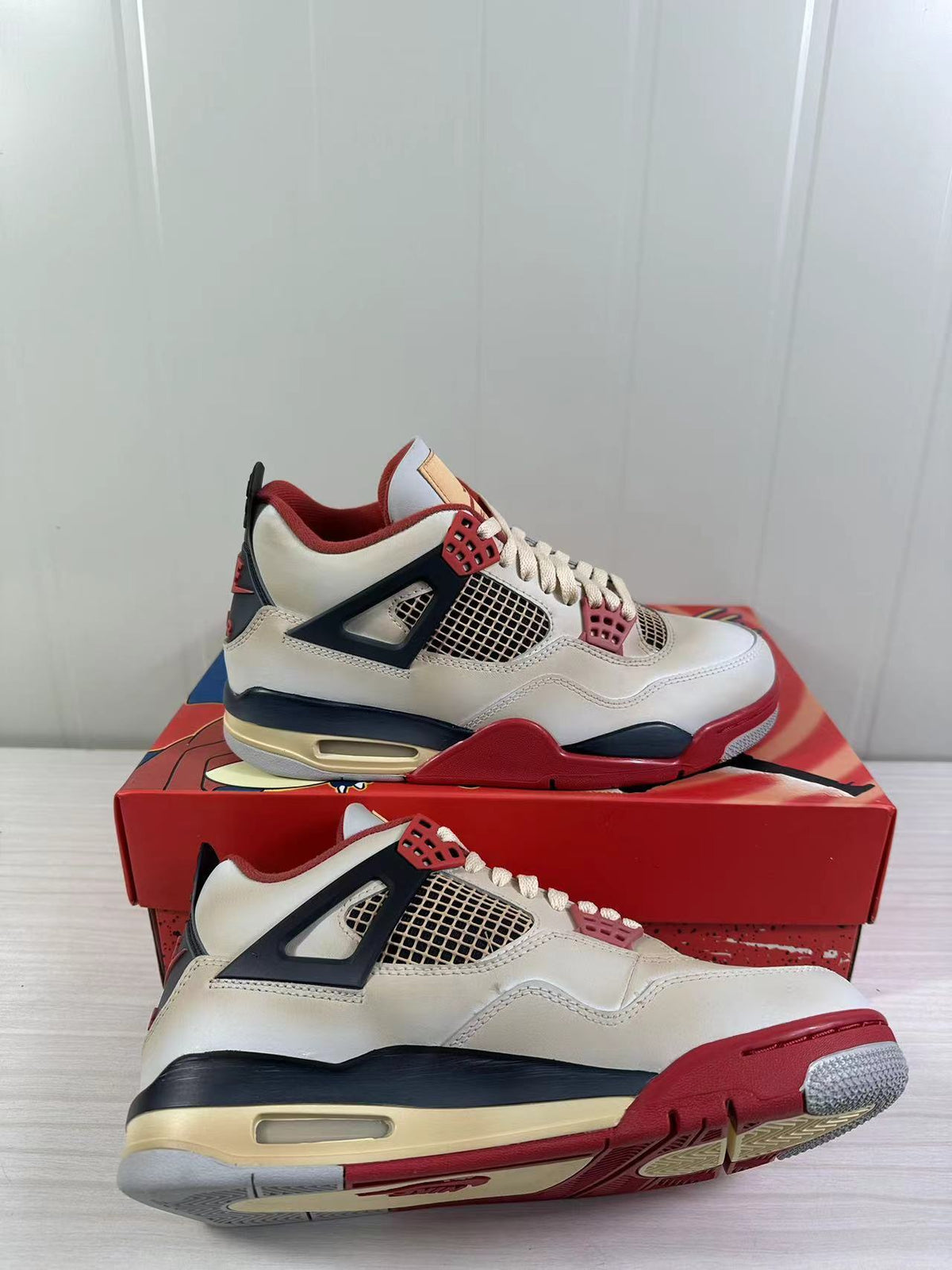 Air Jordan 4 Retro Off-White Red Black AQ9129-105 - product image from the listing.