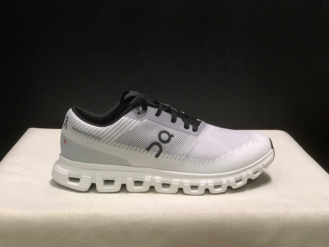 On Cloud 6 Push Sneakers in White Grey Black - product image from the listing.