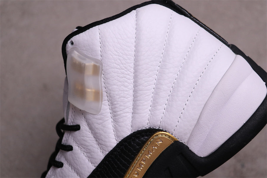 Air Jordan 12 Reverse Flu Game Sneakers White Black Gold - product image from the listing.