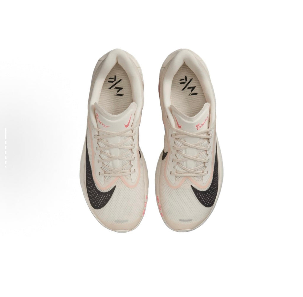 Light Beige and Black Nike ZoomX Running Shoes - product image from the listing.
