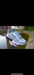 Nike Gray Mesh Sneakers for Running with Black Swoosh - product image from the listing.