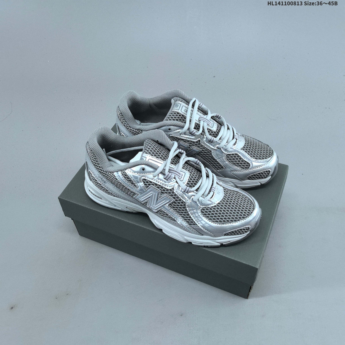 Grey and Silver New Balance 740 Sneakers CR740MG - product image from the listing.