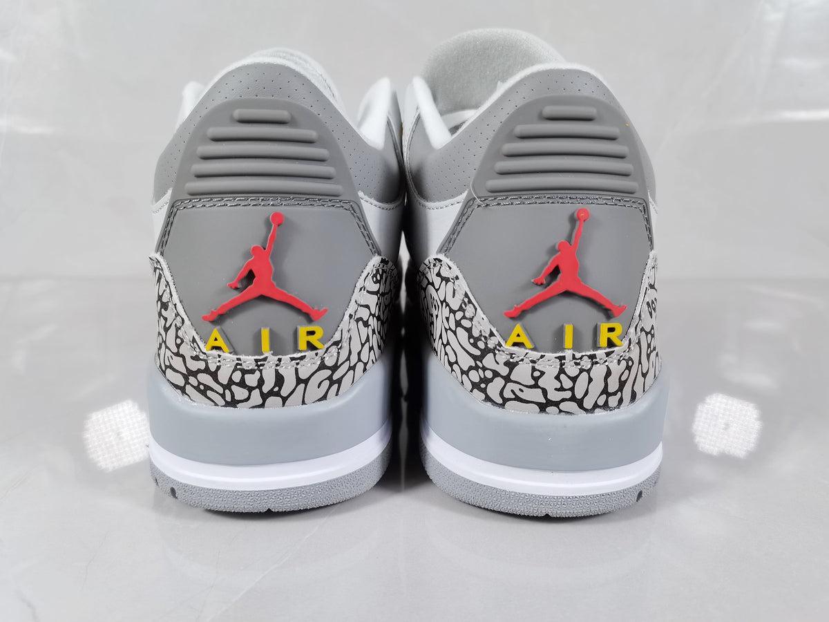 Air Jordan 3 Retro Grey and Orange Sneakers - product image from the listing.
