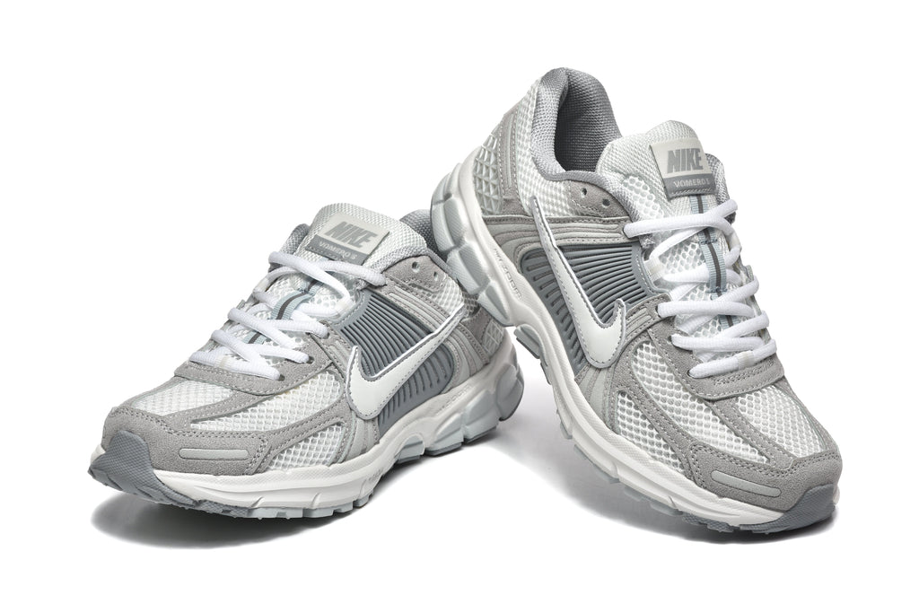 Grey and White Nike Vomero 5 Sneakers - product image from the listing.
