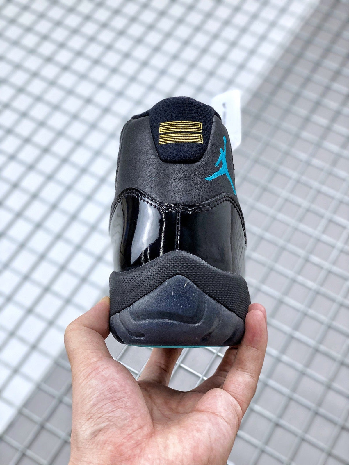 Air Jordan 11 Retro Gamma Black Sneakers 378037-006 - product image from the listing.