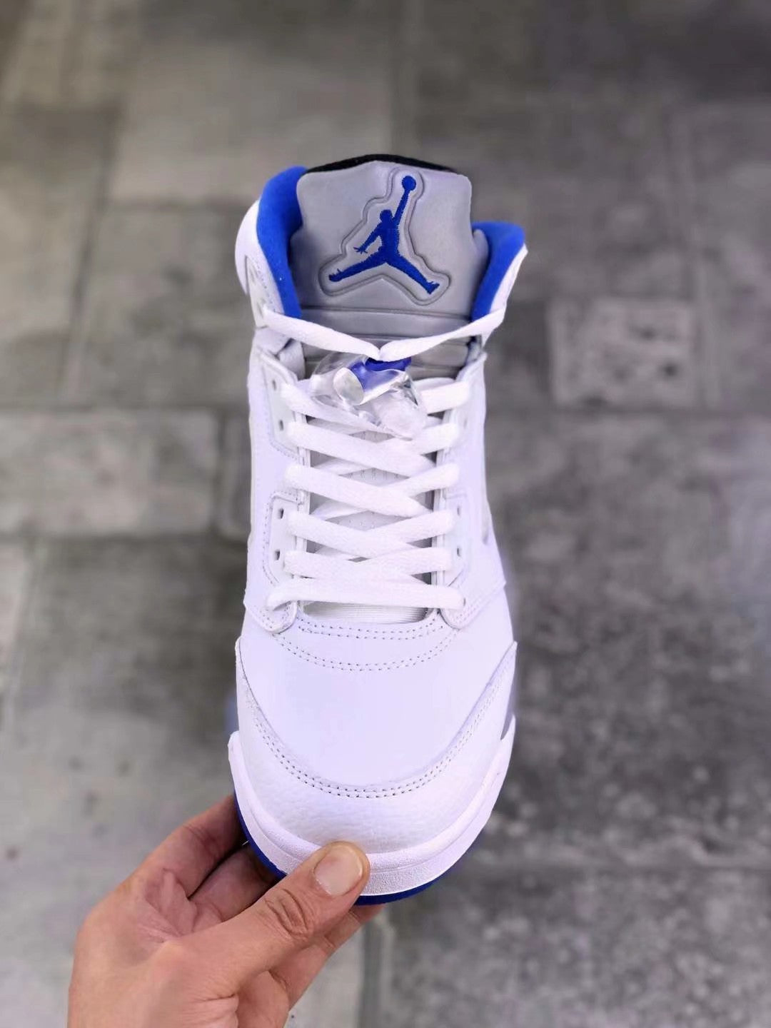 Air Jordan 5 Stealth 2.0 Sneakers in White Blue 440888-140 - product image from the listing.