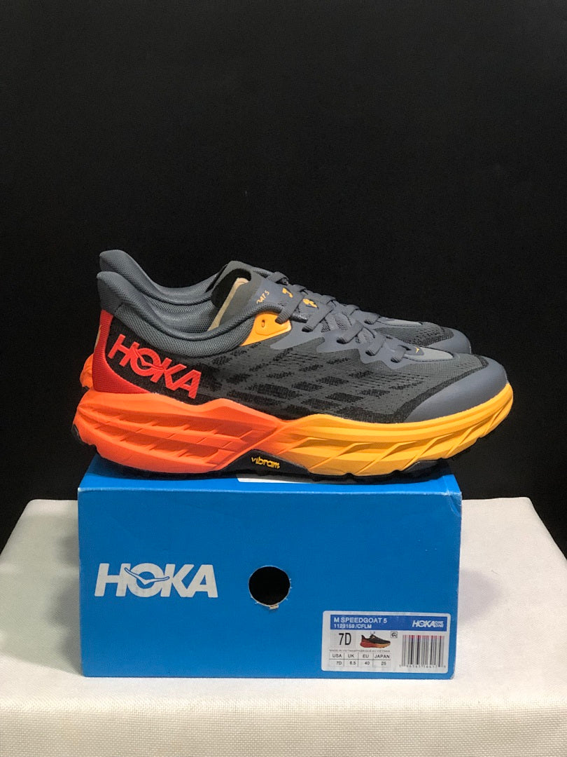 HOKA Speedgoat 5 Trail Running Shoes, in Gray and Orange - product image from the listing.