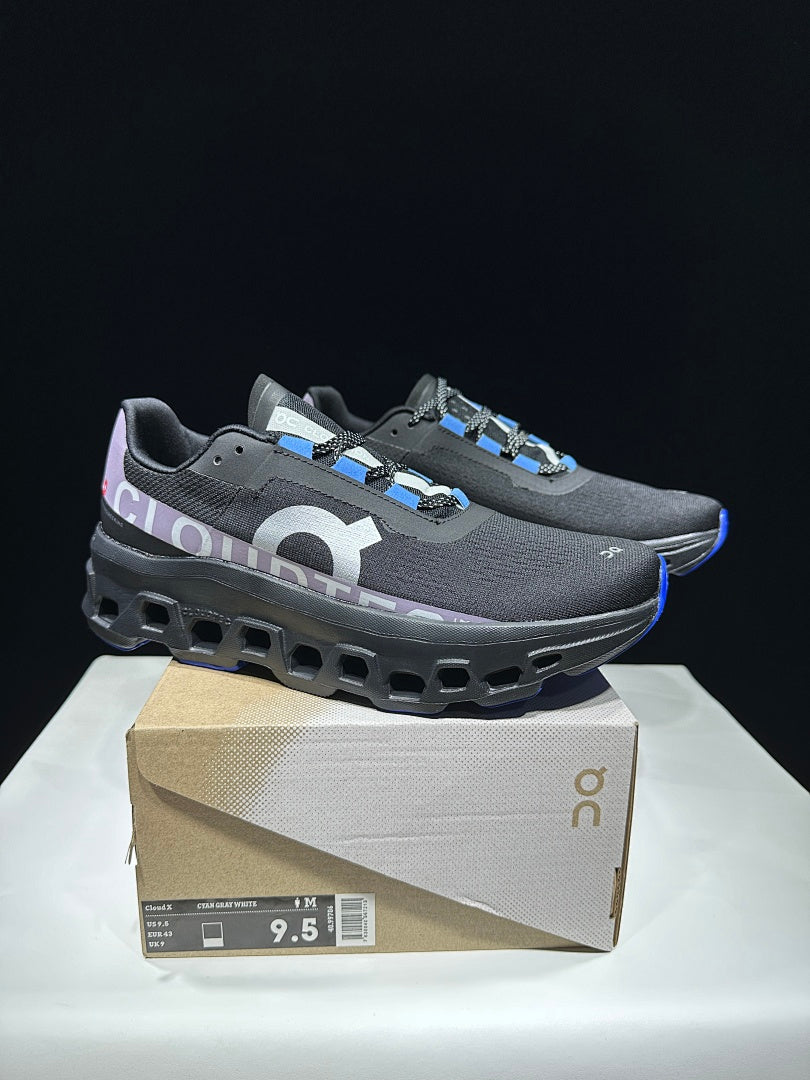 On Cloudmonster Cloud X Sneakers in Black Purple Blue - product image from the listing.
