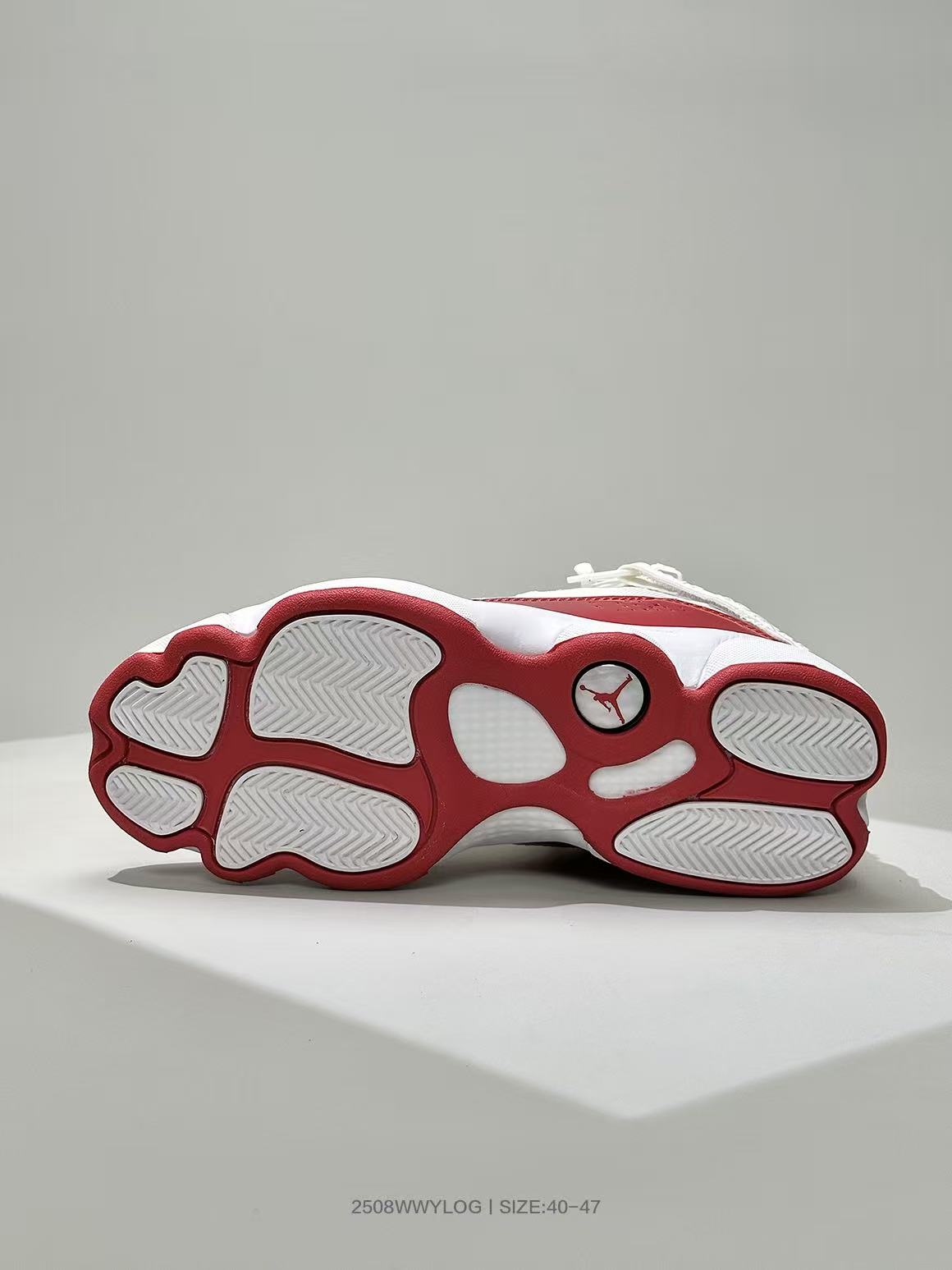 Jordan 6-3 Basketball Sneakers in White and Red - product image from the listing.