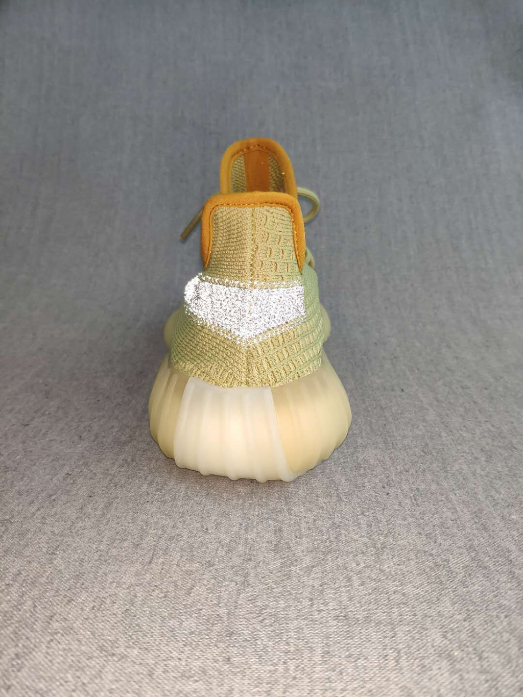 Yeezy 350 V2 Static Reflective Sneakers in Green - product image from the listing.