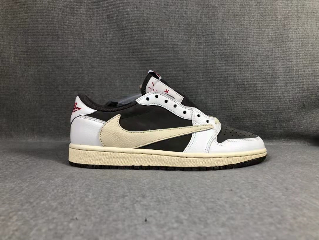 Travis Scott x Air Jordan 1 Low Sneakers in White Brown - product image from the listing.