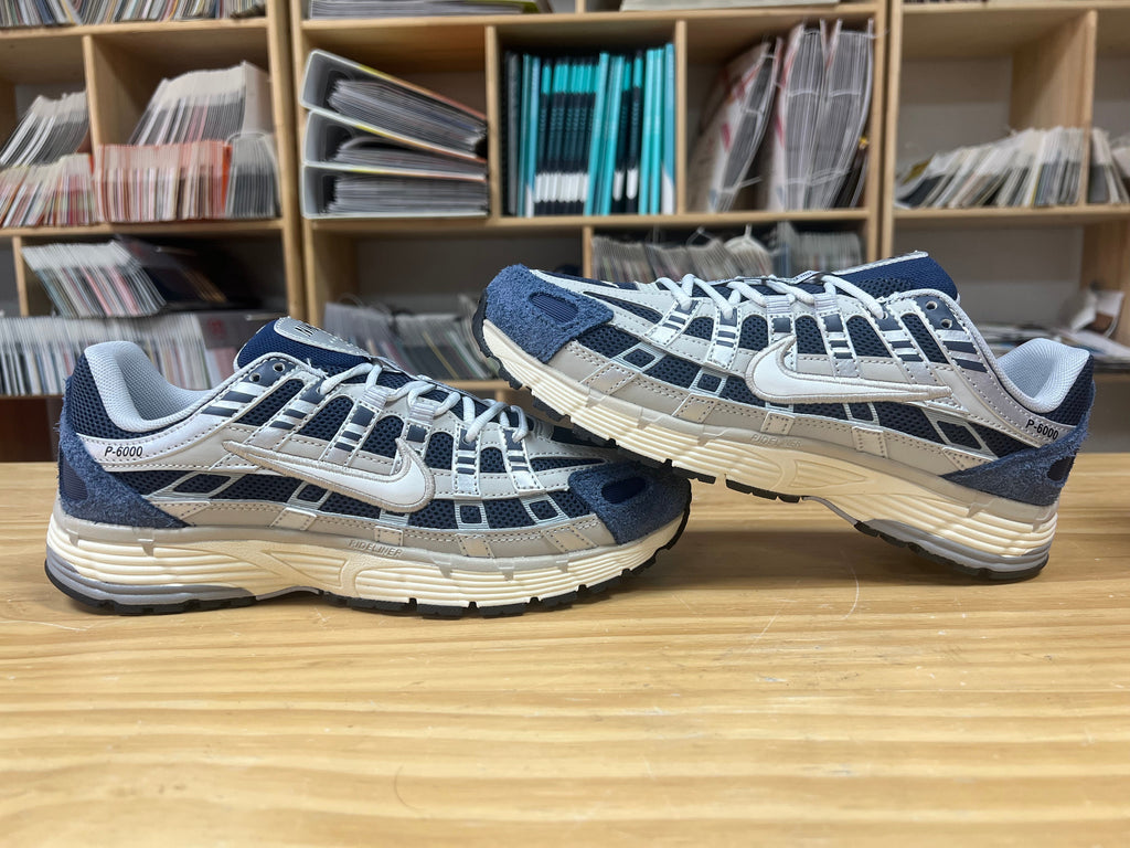 Nike P-6000 Sneakers in Navy and Light Gray IU7549-400 - product image from the listing.
