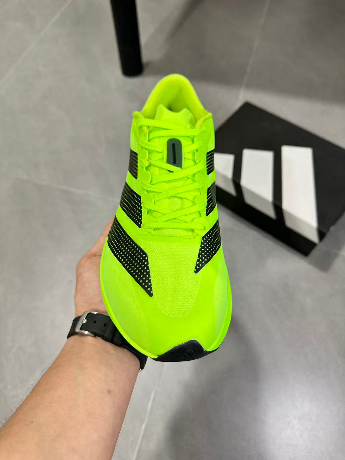 adidas Adizero Evo SL 2 Neon Running Shoes in Yellow - product image from the listing.